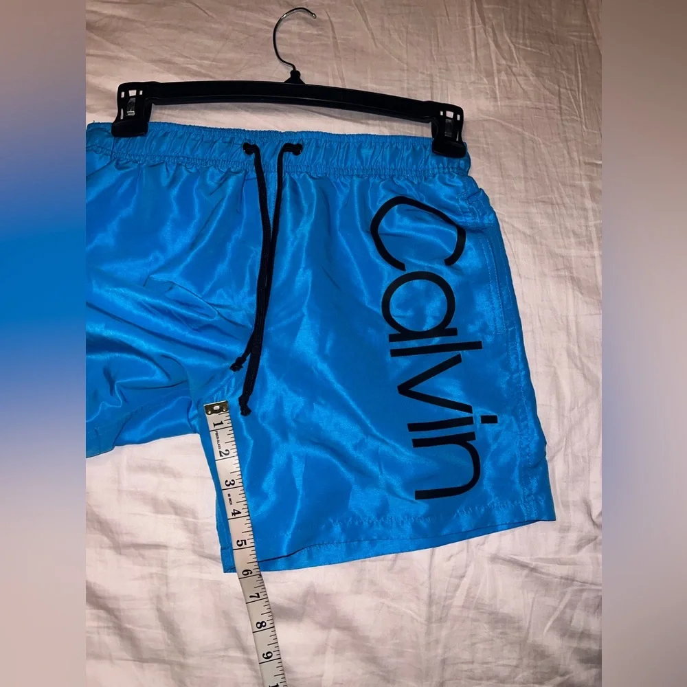 Calvin Klein Men’s Light Blue Lined Swim Trunks Size S